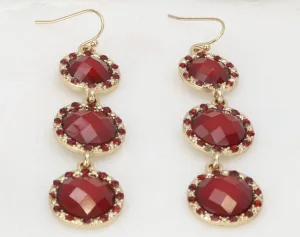 Red faceted tri-disc dangle earrings